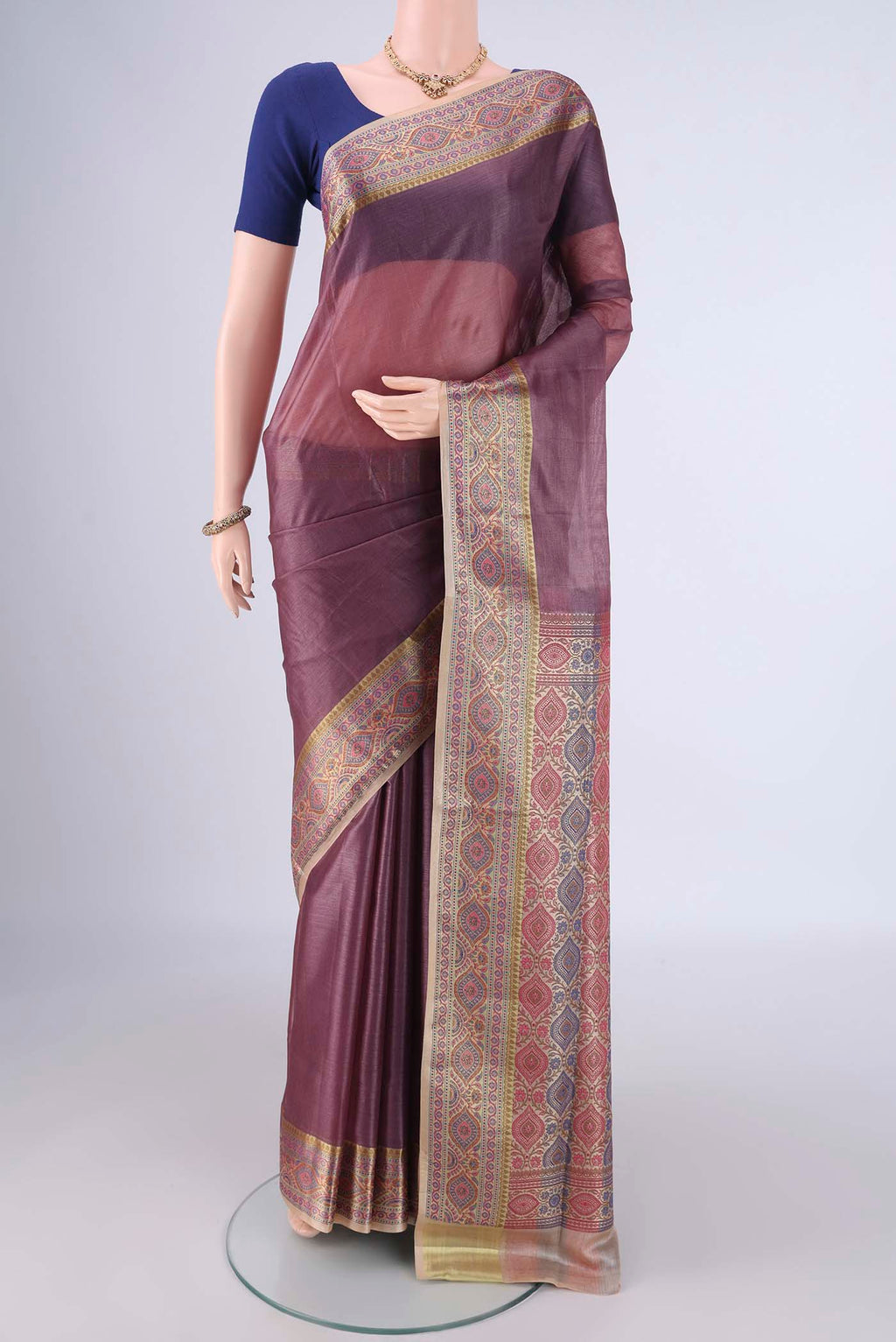 Mauve Banarasi Tussar Silk Saree with Plain Body and Zari Border.  displayed on a mannequin