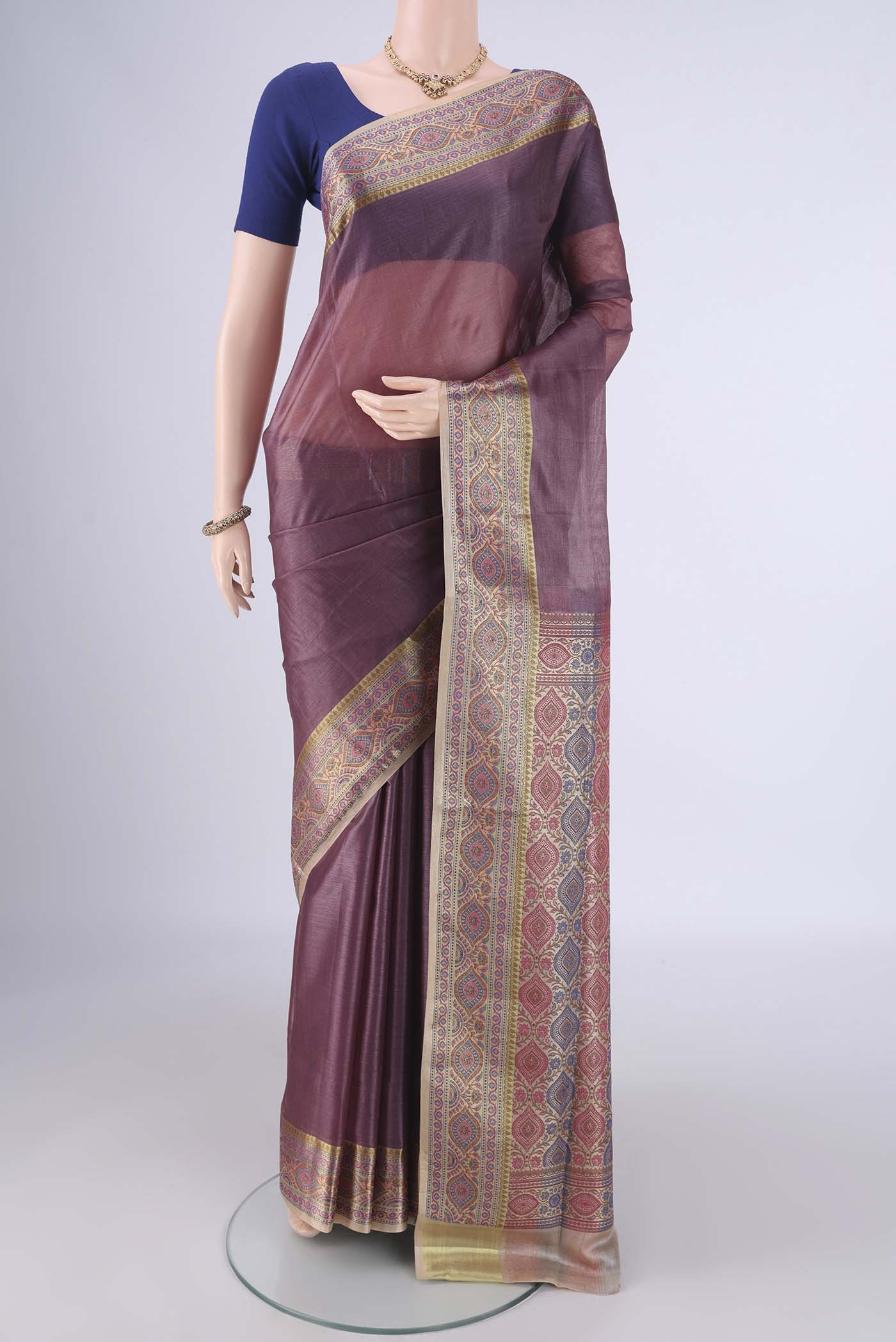 Mauve Banarasi Tussar Silk Saree with Plain Body and Zari Border.  displayed on a mannequin