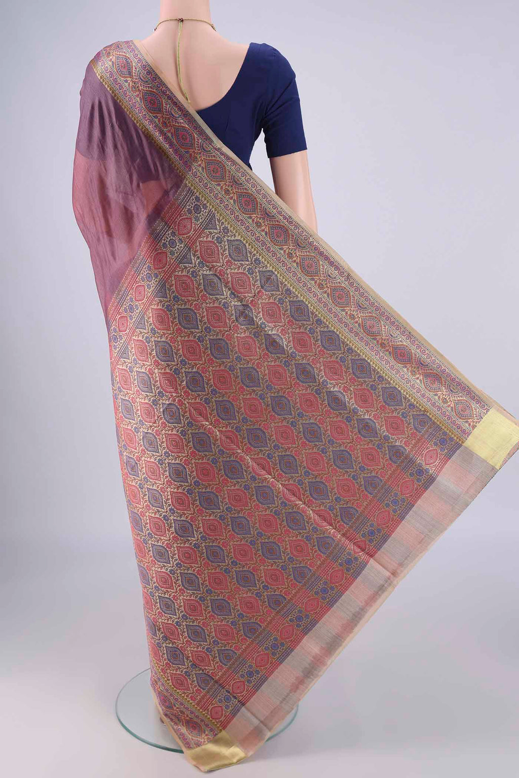 Flat view of Mauve Banarasi Tussar Silk Saree with Plain Body and Zari Border. 