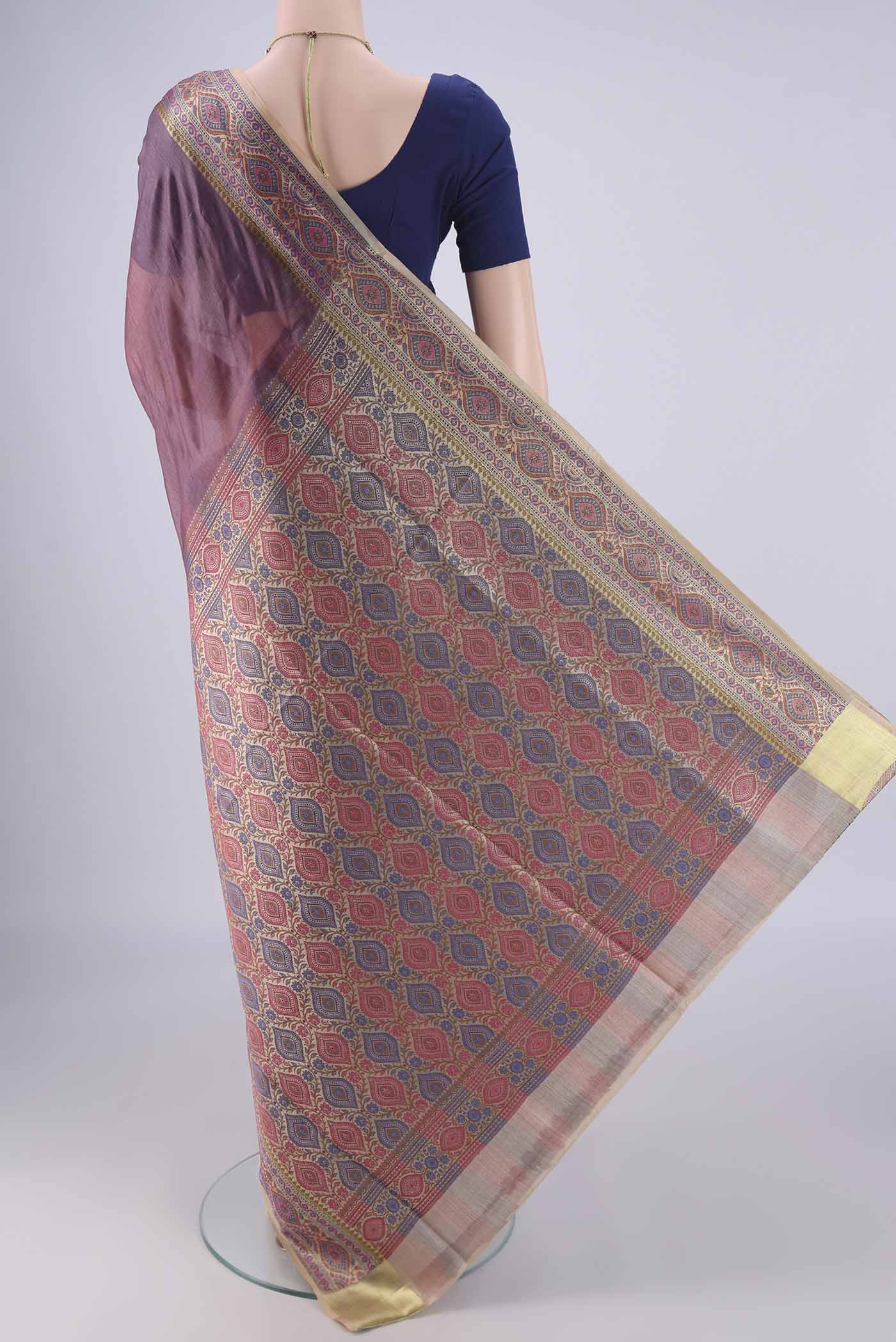 Flat view of Mauve Banarasi Tussar Silk Saree with Plain Body and Zari Border. 