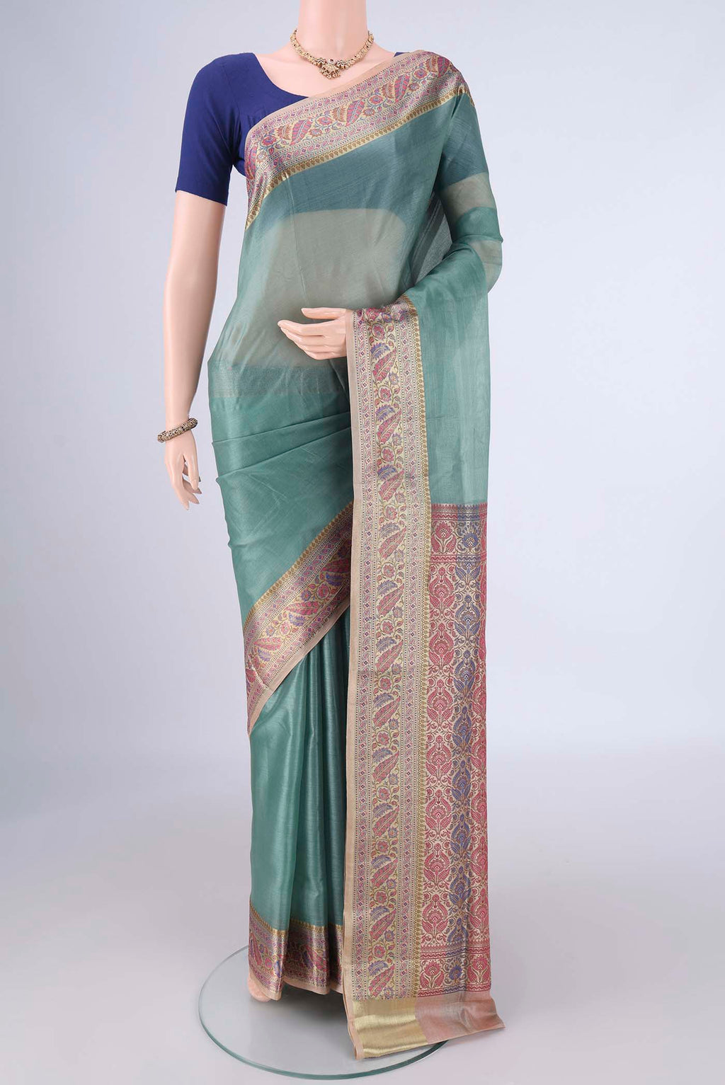 Light Blue Banarasi Tussar Silk Saree with Plain Body and Zari Border.  displayed on a mannequin