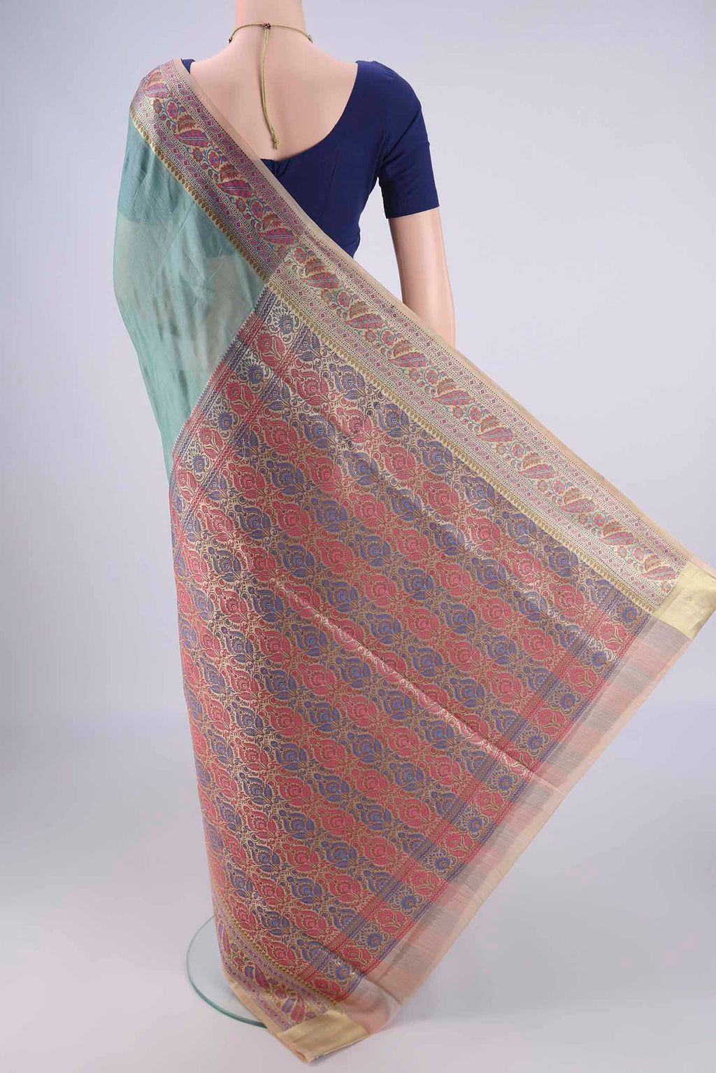 Flat view of Light Blue Banarasi Tussar Silk Saree with Plain Body and Zari Border. 