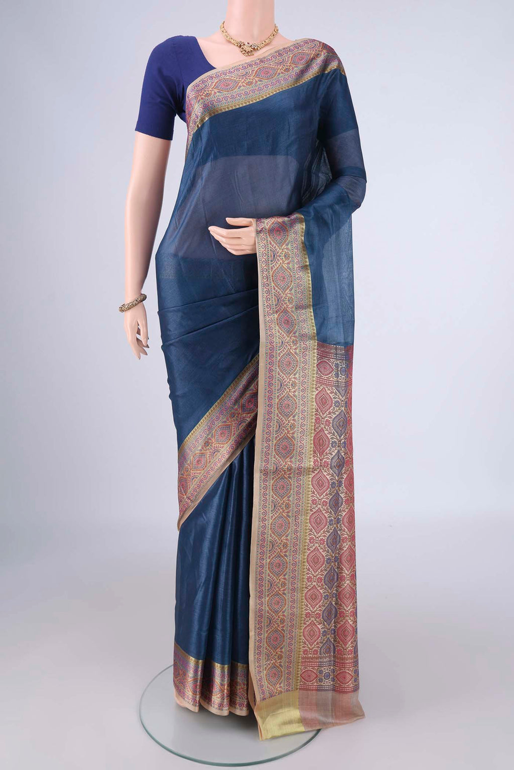 Blue Banarasi Tussar Silk Saree with Plain Body and Zari Border.  displayed on a mannequin