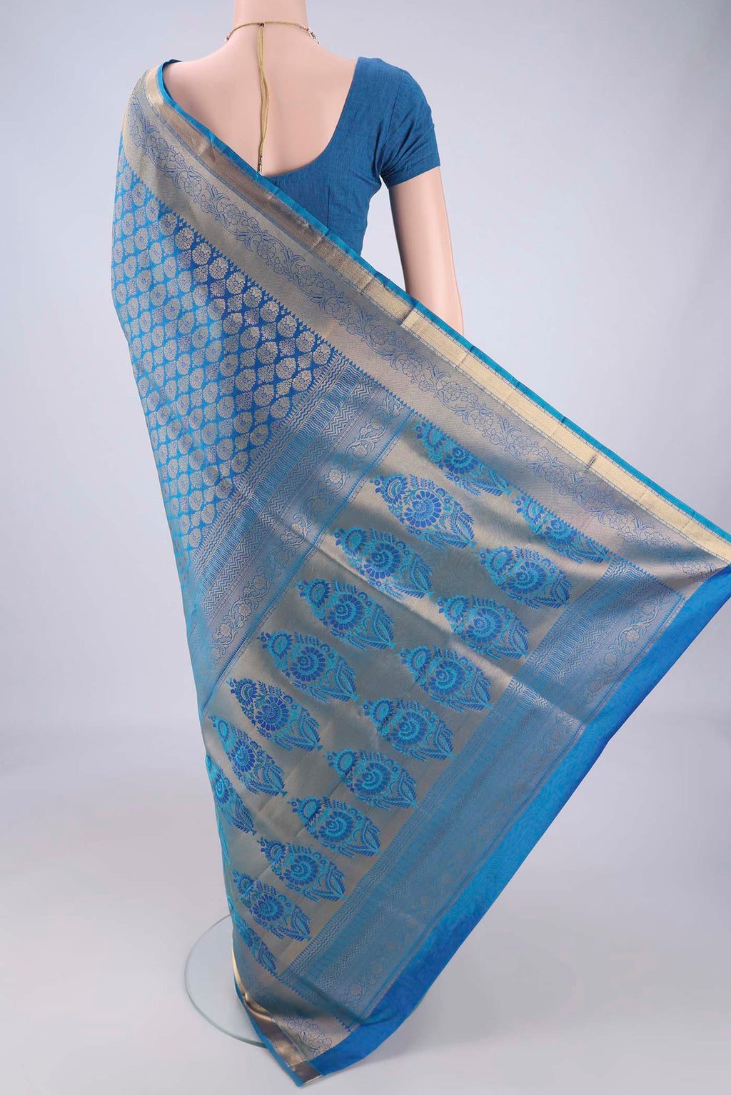 Flat view of Blue Soft Silk Saree with Zari Brocade on the body and Zari Border. 