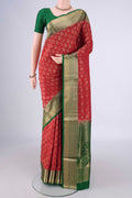 Red Soft Silk Saree with Zari Brocade on the body and Zari Border.  displayed on a mannequin