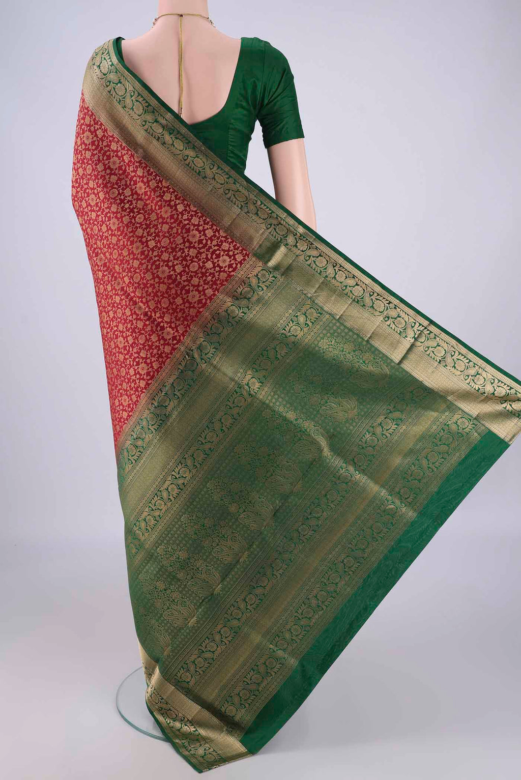 Flat view of Maroon Soft Silk Saree with Zari Brocade on the body and Zari Border. 