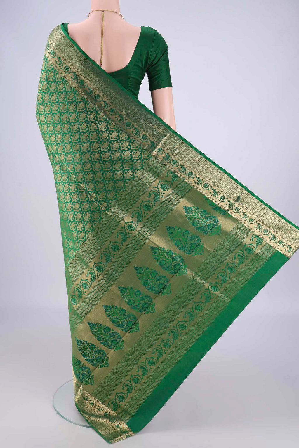 Flat view of Green Soft Silk Saree with Zari Brocade on the body and Zari Border. 