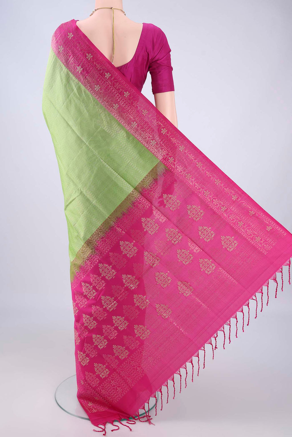 Flat view of Light Green Soft Silk Saree with Zari Brocade on the body and Zari Border. 