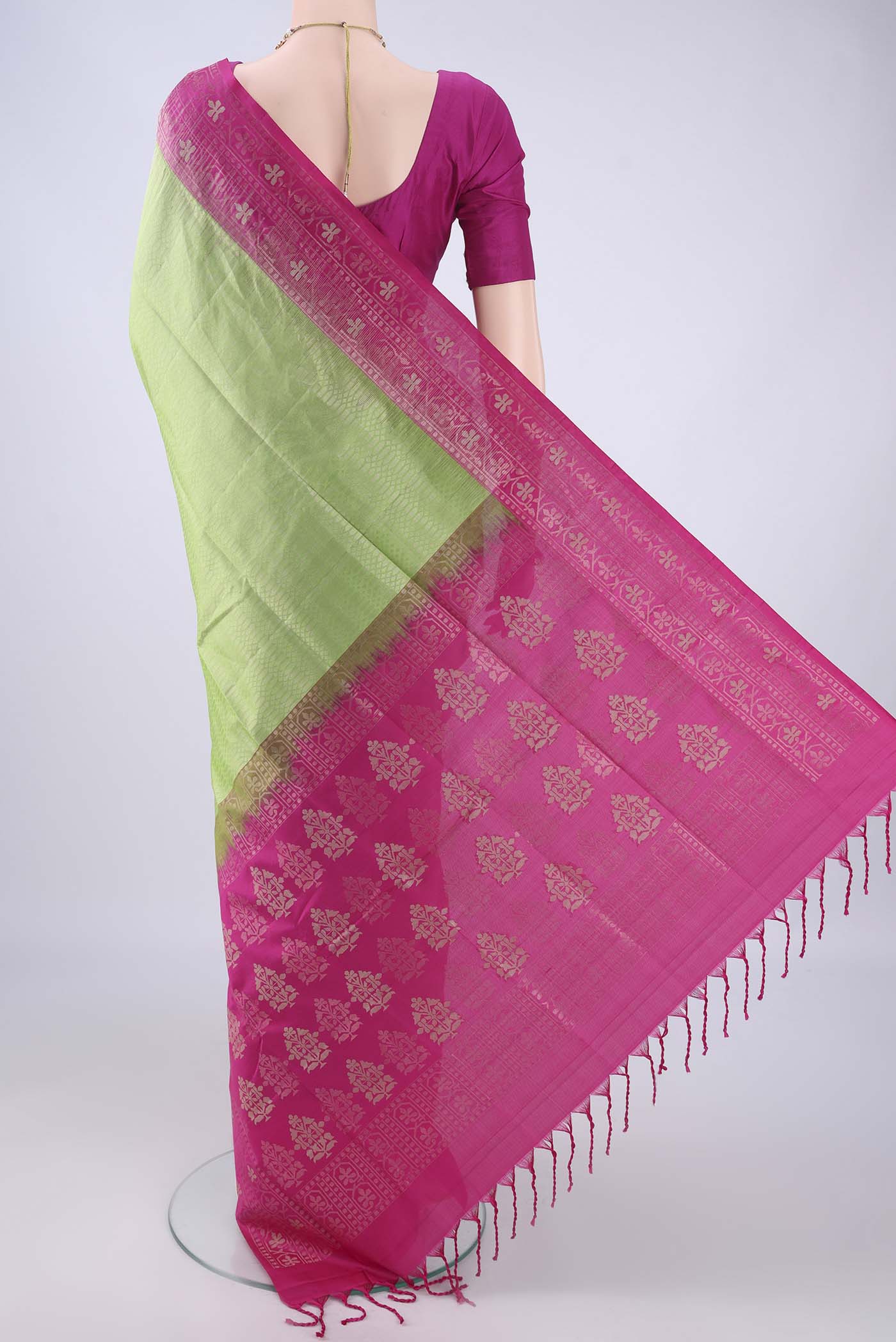 Flat view of Light Green Soft Silk Saree with Zari Brocade on the body and Zari Border. 