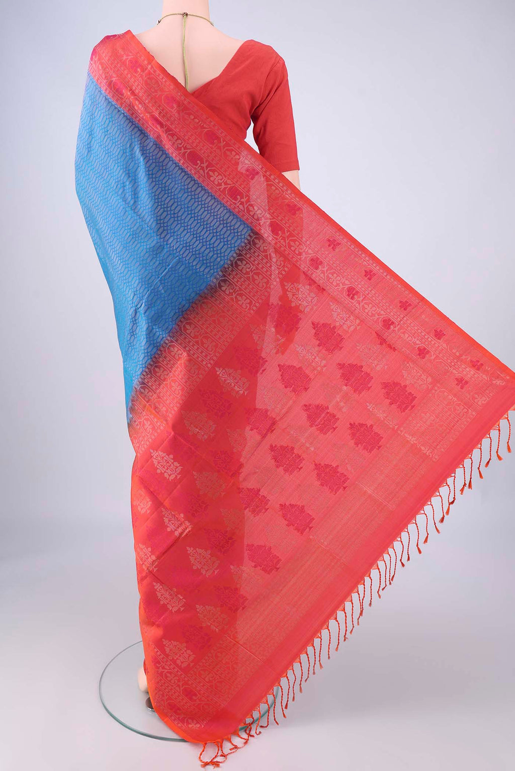Flat view of Blue Soft Silk Saree with Zari Brocade on the body and Zari Border. 