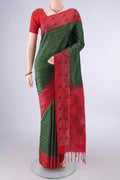 Pure Silk Bottle Green Soft Saree with Zari Brocade on the body and Zari And Thread Border.  displayed on a mannequin