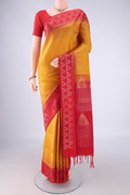 Mustard Soft Silk Saree with Zari Brocade on the body and Zari And Thread Border.  displayed on a mannequin