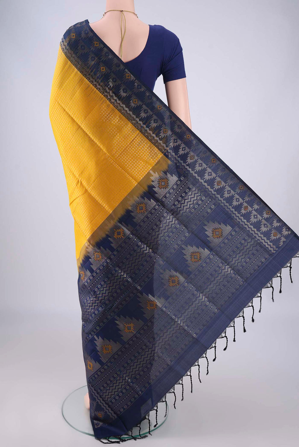 Flat view of Yellow Soft Silk Saree with Zari Brocade on the body and Zari Border. 