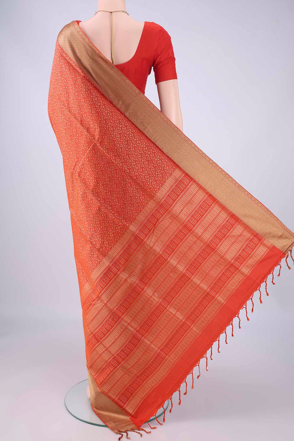 Flat view of Rust Soft Silk Saree with Thread Brocade on the body and Thread Border. 