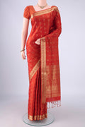 Brick Orange Soft Silk Saree with Jacquard With Zari Butta on the body and Zari Border.  displayed on a mannequin