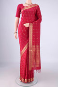 Rani Pink Soft Silk Saree with Jacquard With Zari Butta on the body and Zari Border.  displayed on a mannequin