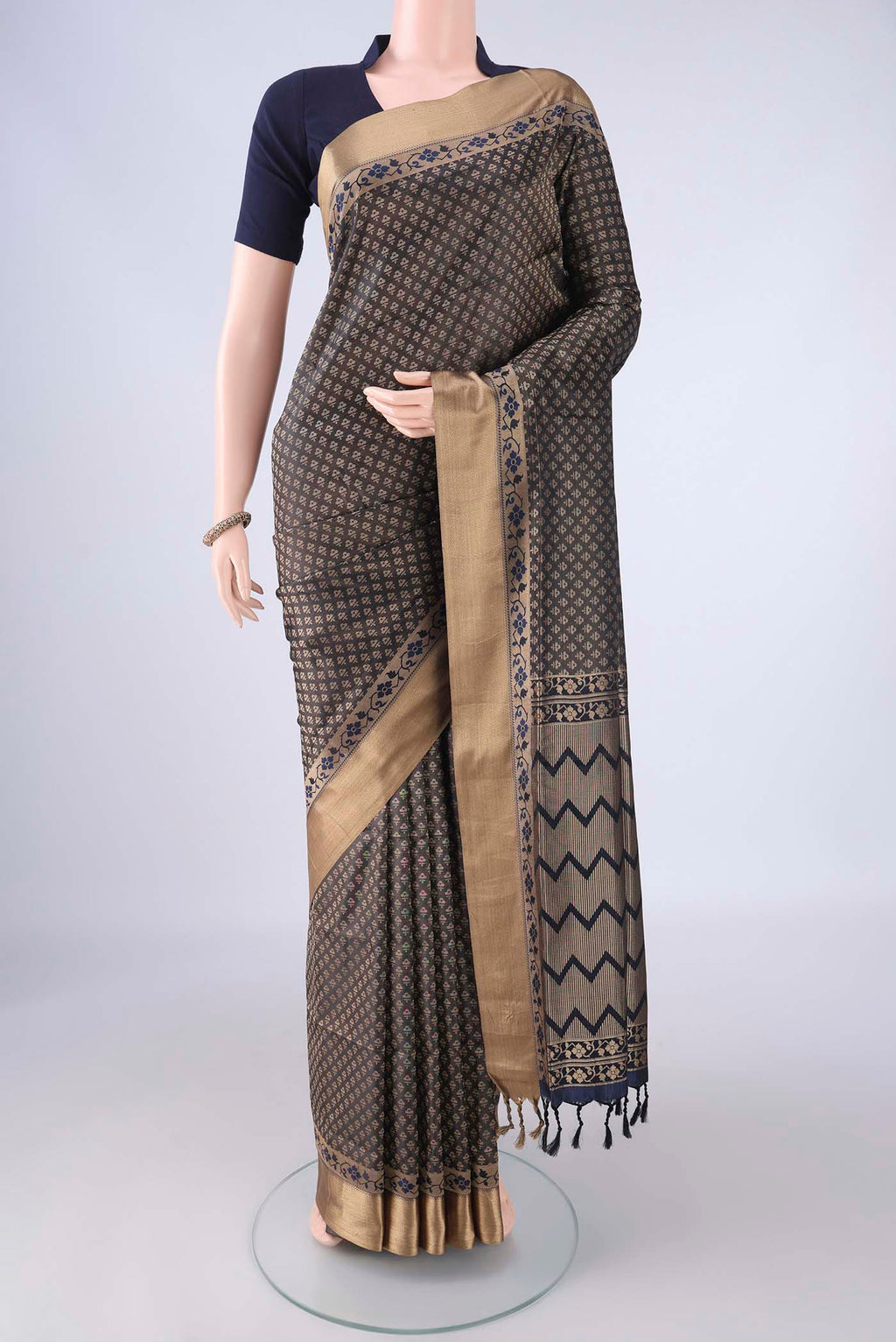 Black Soft Silk Saree with Jacquard design on the body and Thread Border.  displayed on a mannequin
