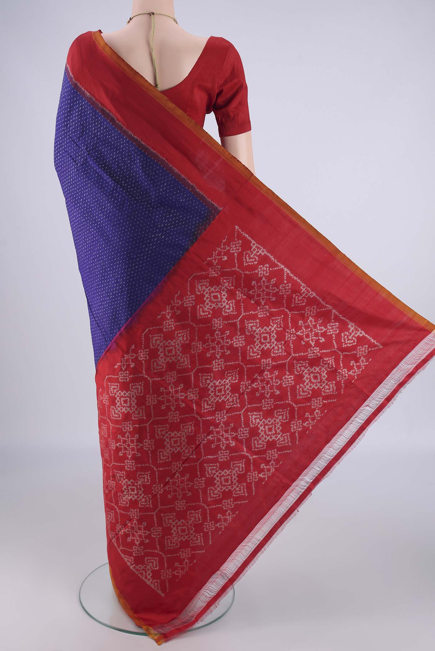 Flat view of Dark Blue Pochampally Silk Saree with Pure Ikat on the body and Plain Border. 