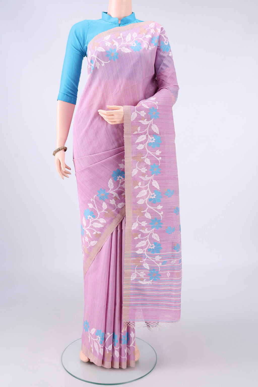 Pure Silk Rose pink Jute Saree with Jamdani on the body and Fancy Border.  displayed on a mannequin