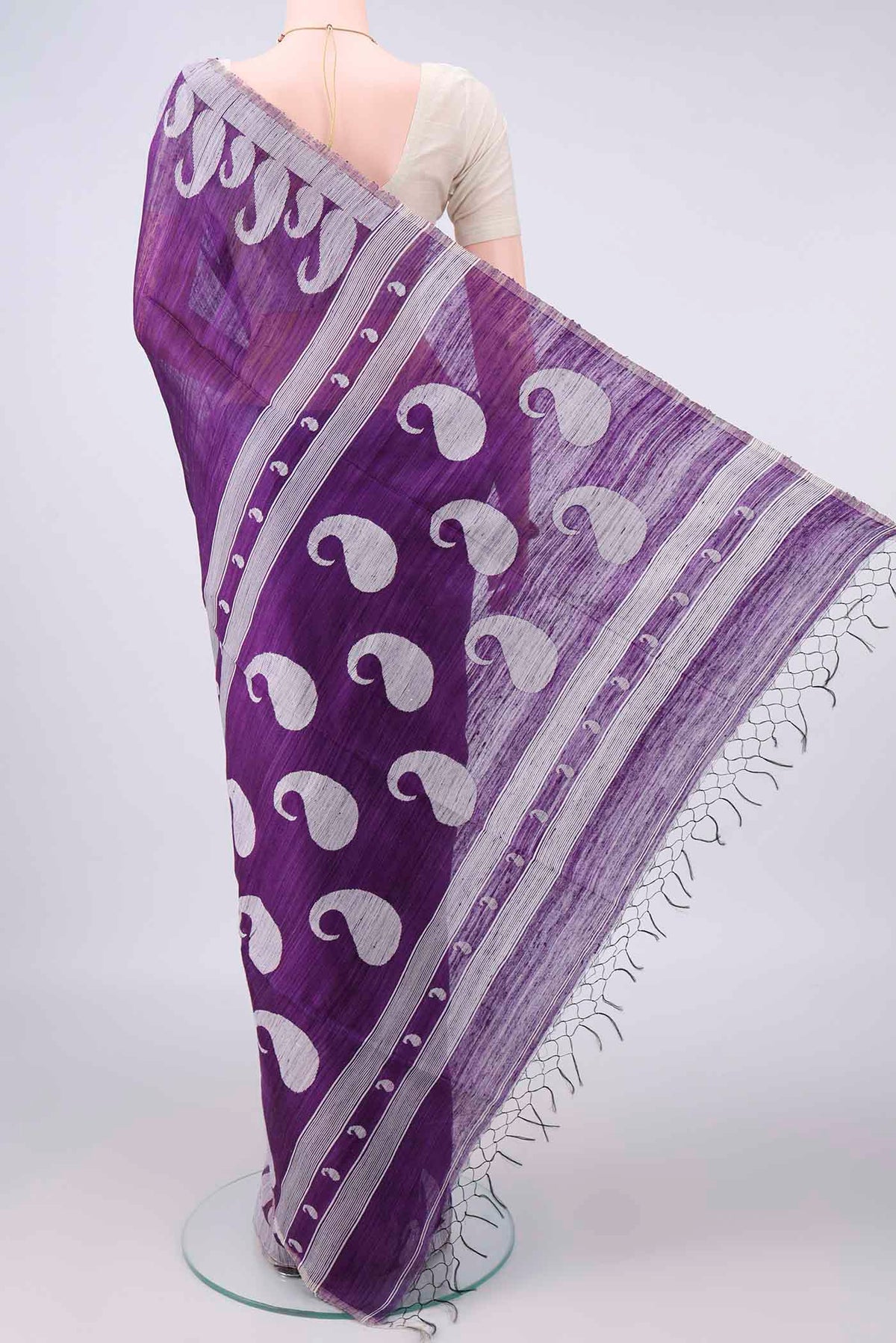 Flat view of Pure Silk Purple Jute Saree with Jamdani on the body and Fancy Border. 
