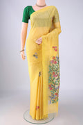 Lemon Yellow Jute Silk Saree with Thread Butta on the body and Plain Border.  displayed on a mannequin