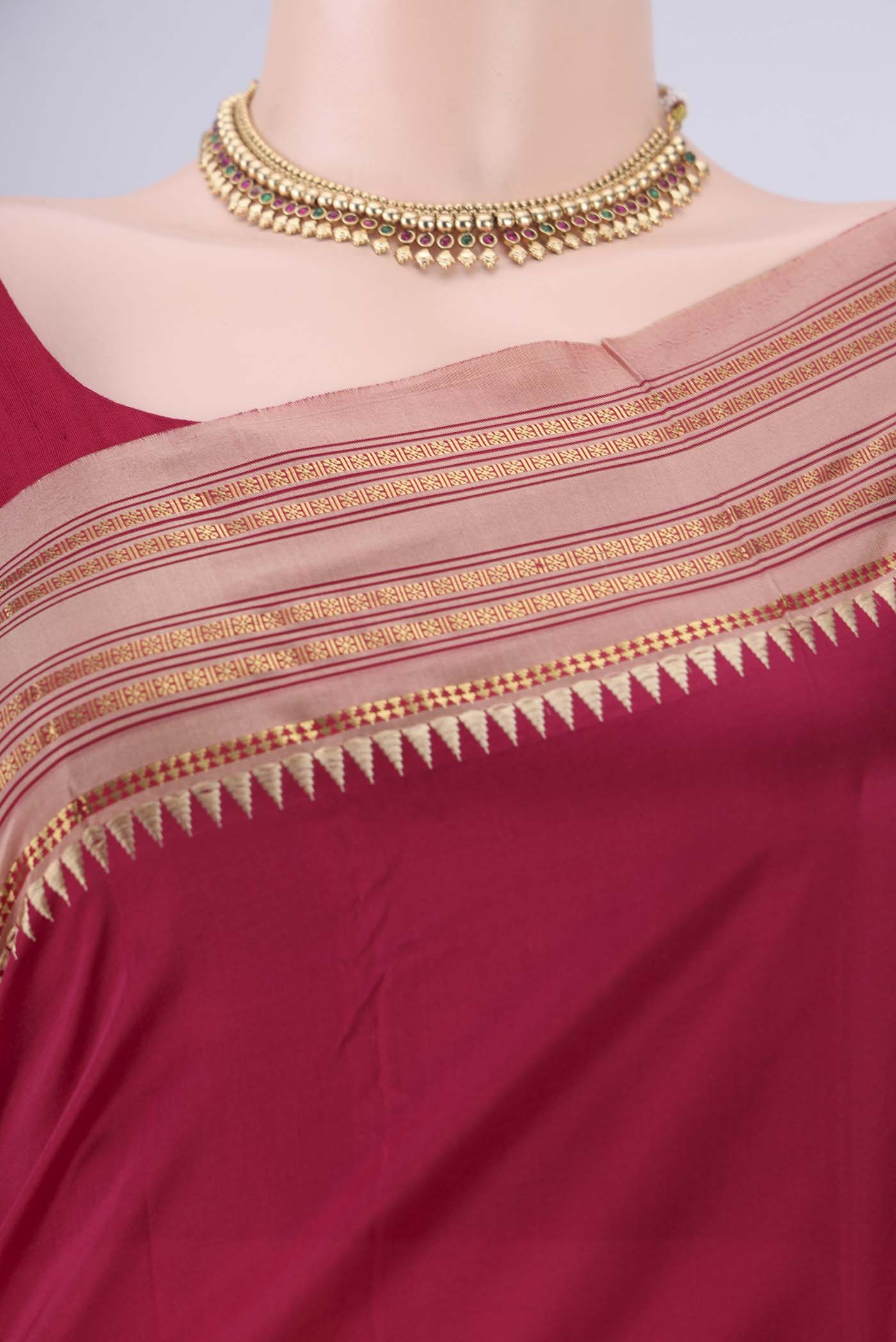Border image of Maroon Narayanpet Silk Saree with Printed design on the body and Zari Border. 