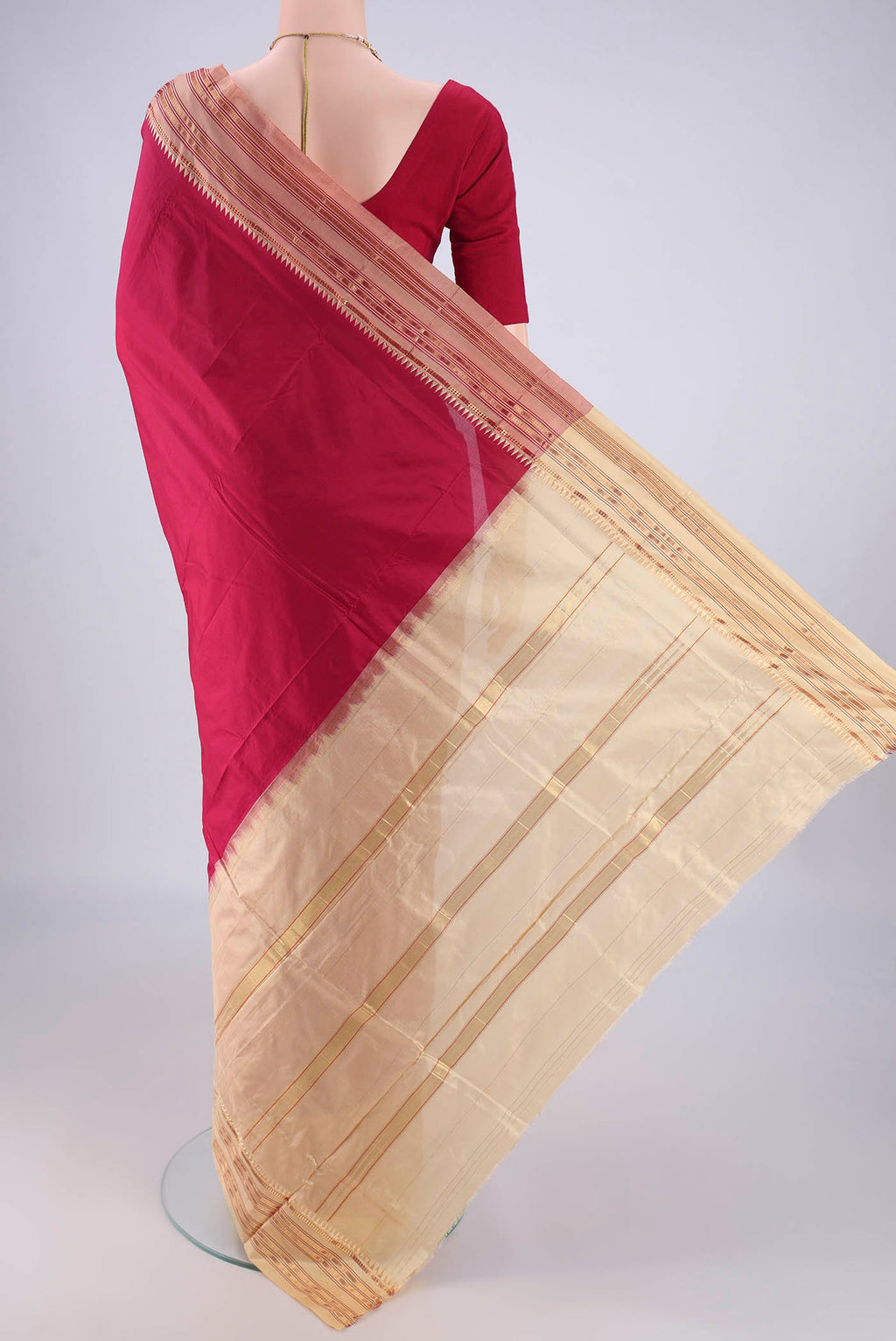 Flat view of Maroon Narayanpet Silk Saree with Printed design on the body and Zari Border. 