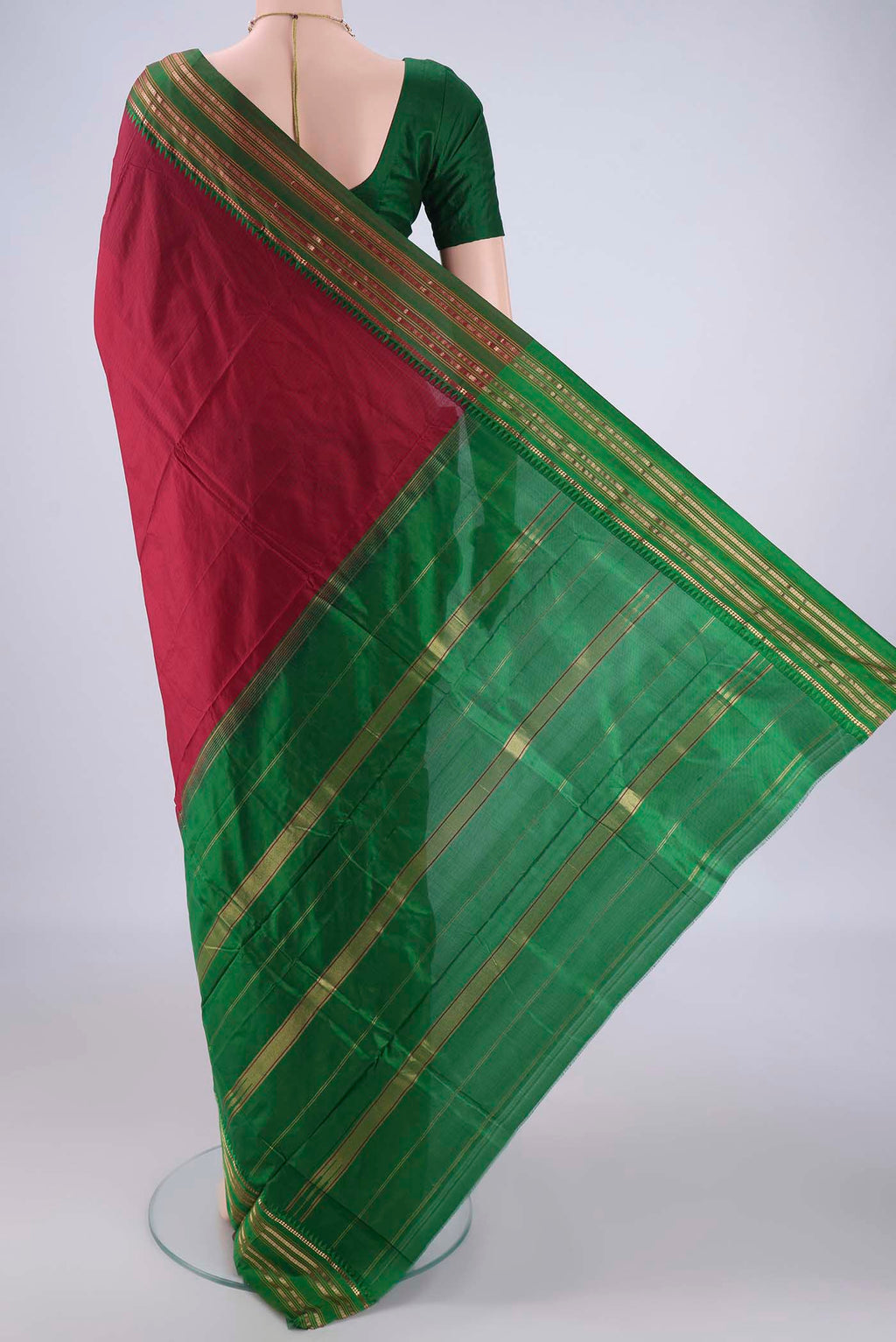 Flat view of Maroon Narayanpet Silk Saree with Checked design on the body and Zari Border. 