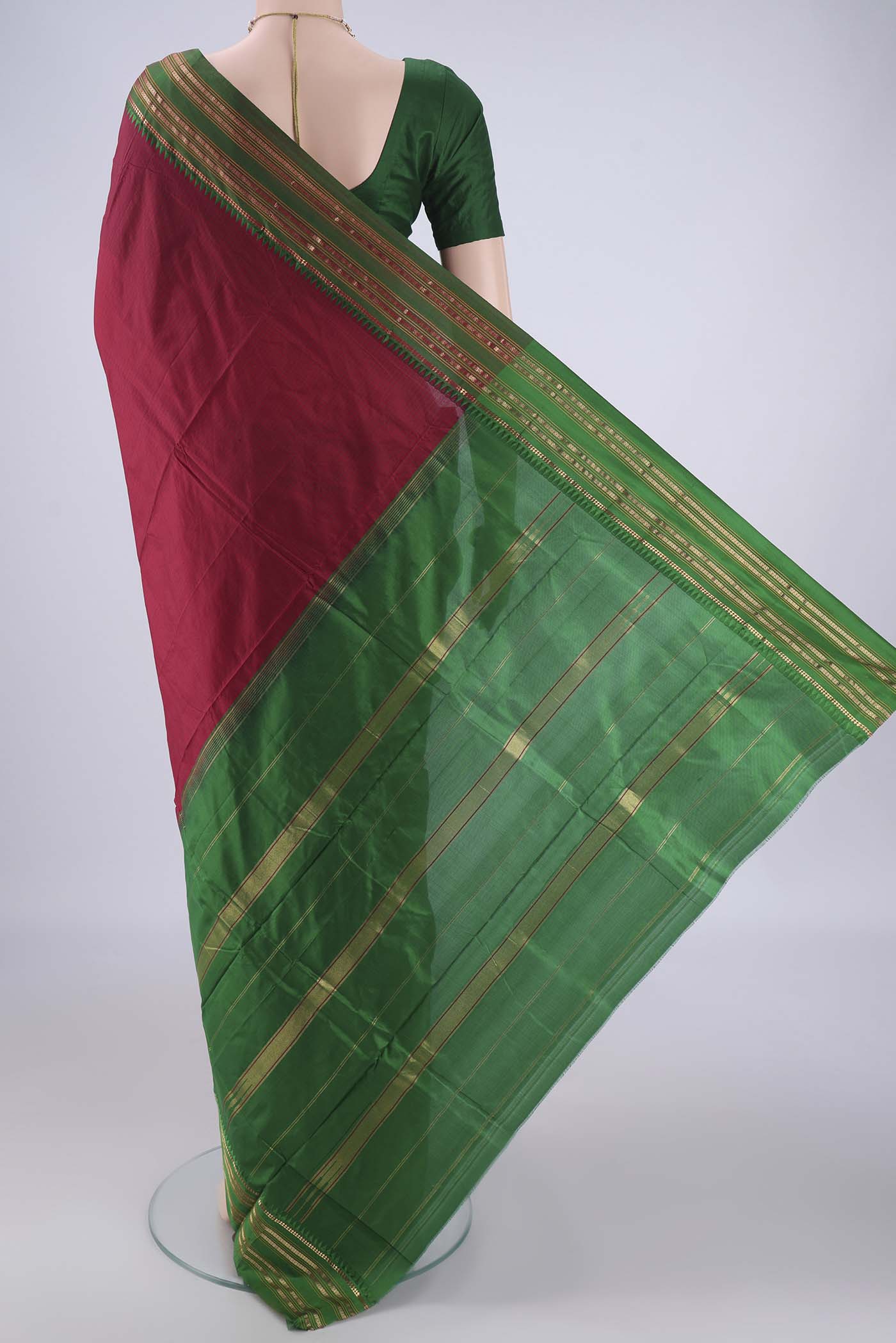 Flat view of Maroon Narayanpet Silk Saree with Checked design on the body and Zari Border. 