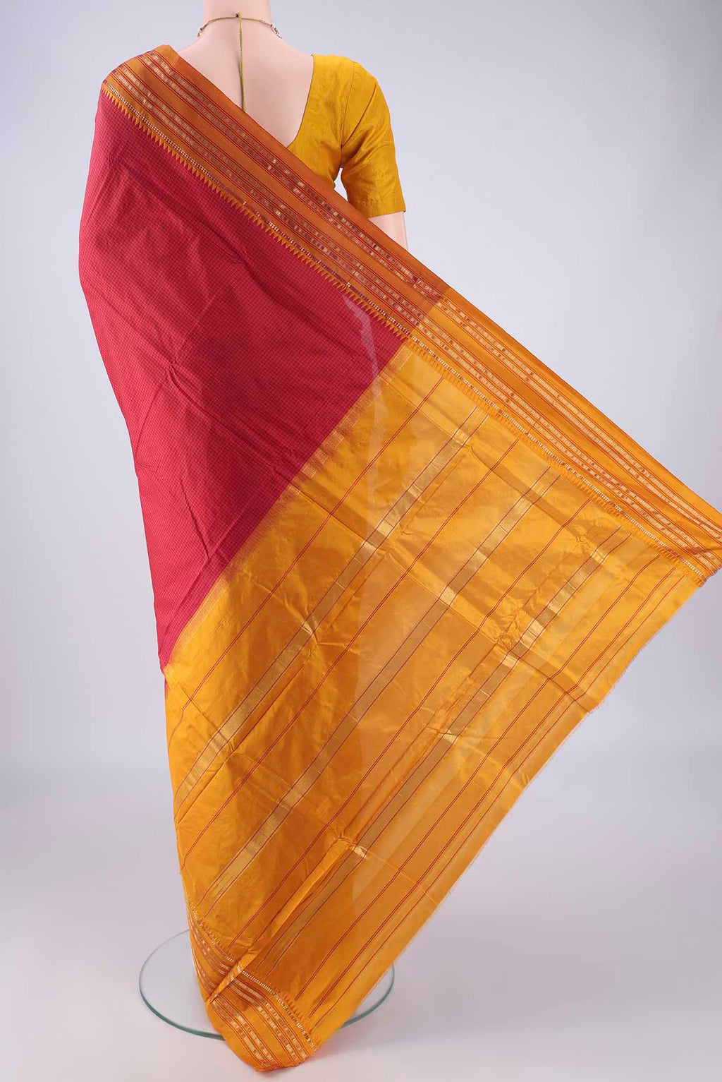 Flat view of Red Narayanpet Silk Saree with Checked design on the body and Zari Border. 