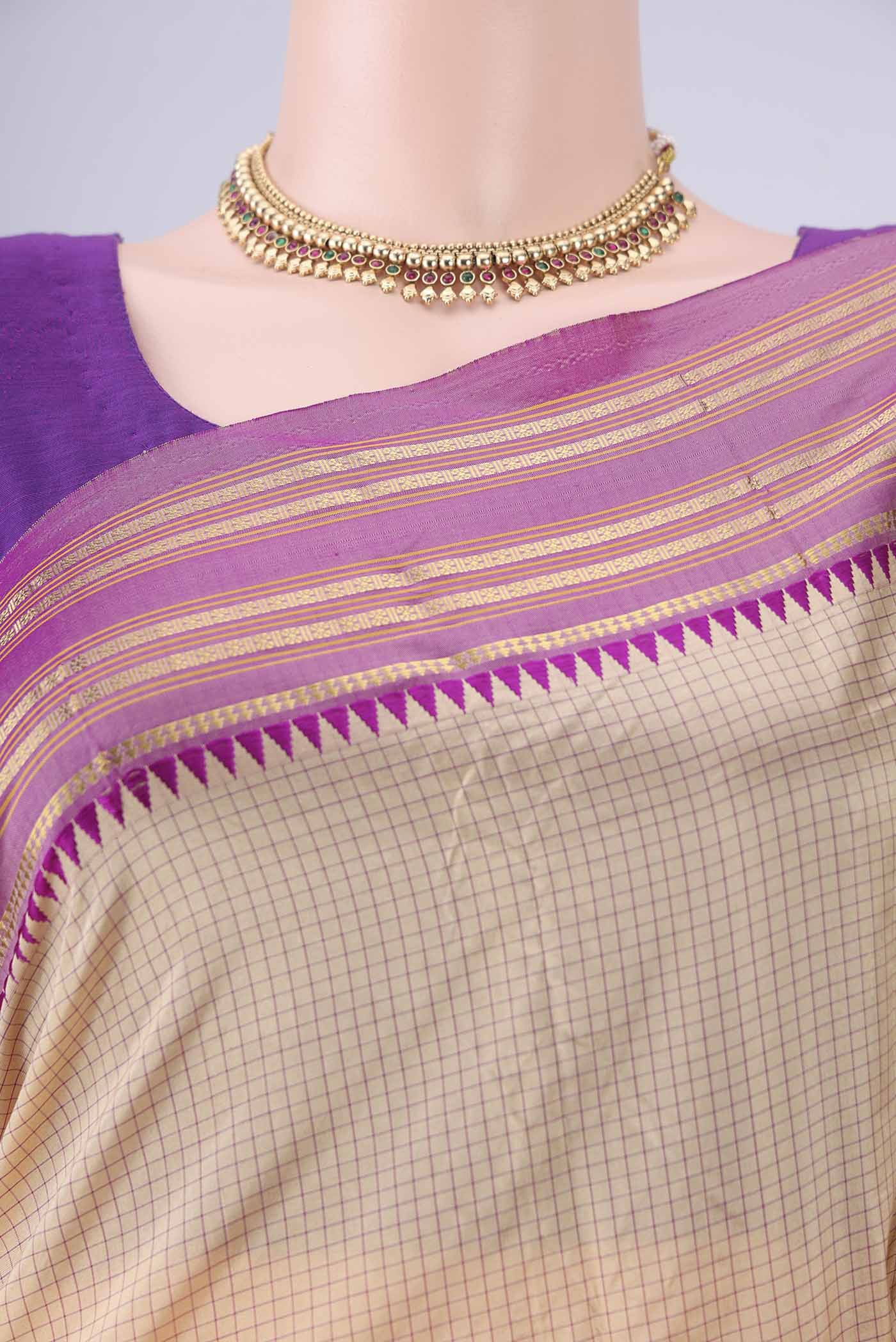 Border image of Beige Narayanpet Silk Saree with Checked design on the body and Temple Border. 