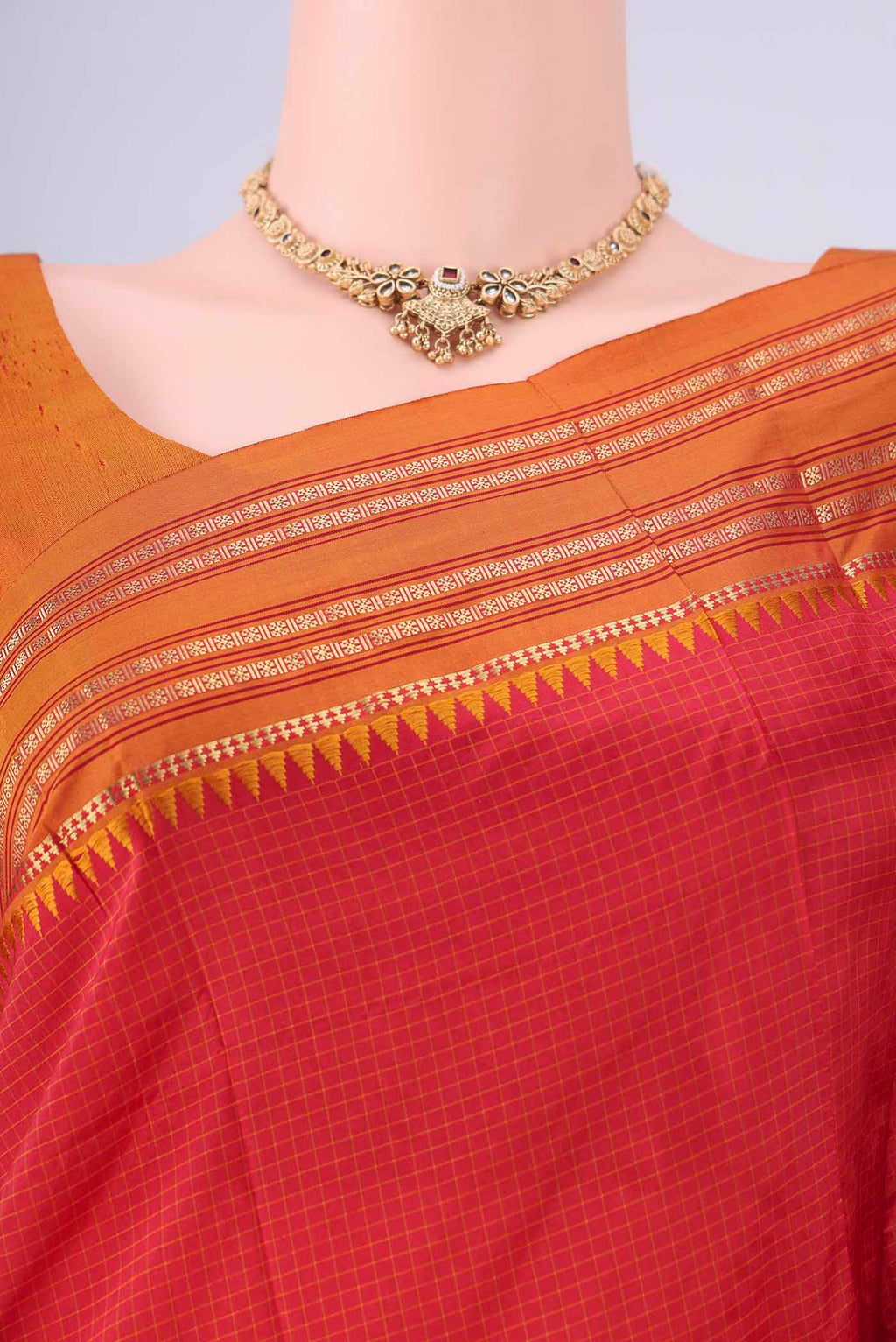 Border image of Red Narayanpet Silk Saree with Checked design on the body and Temple Border. 