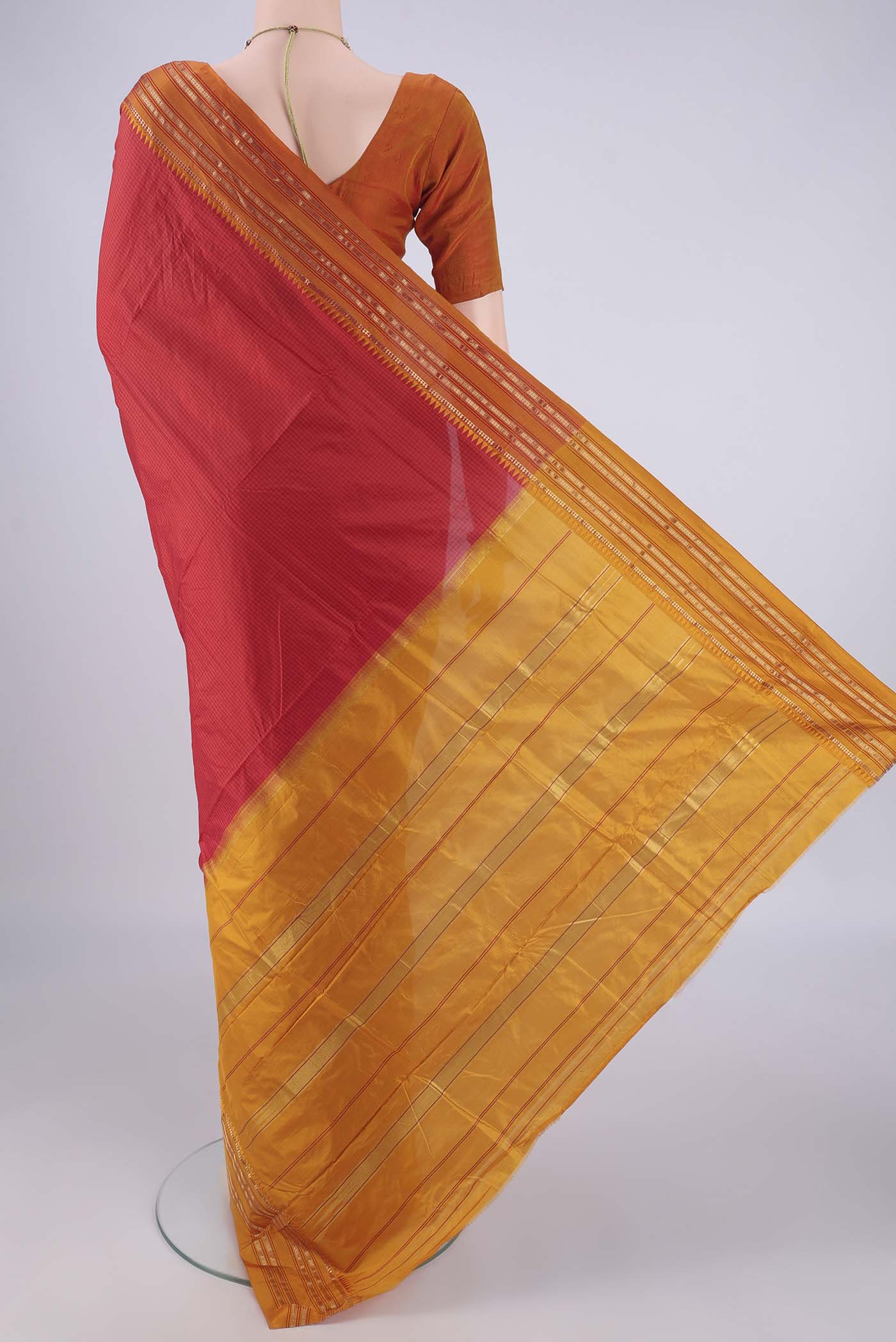 Flat view of Red Narayanpet Silk Saree with Checked design on the body and Temple Border. 