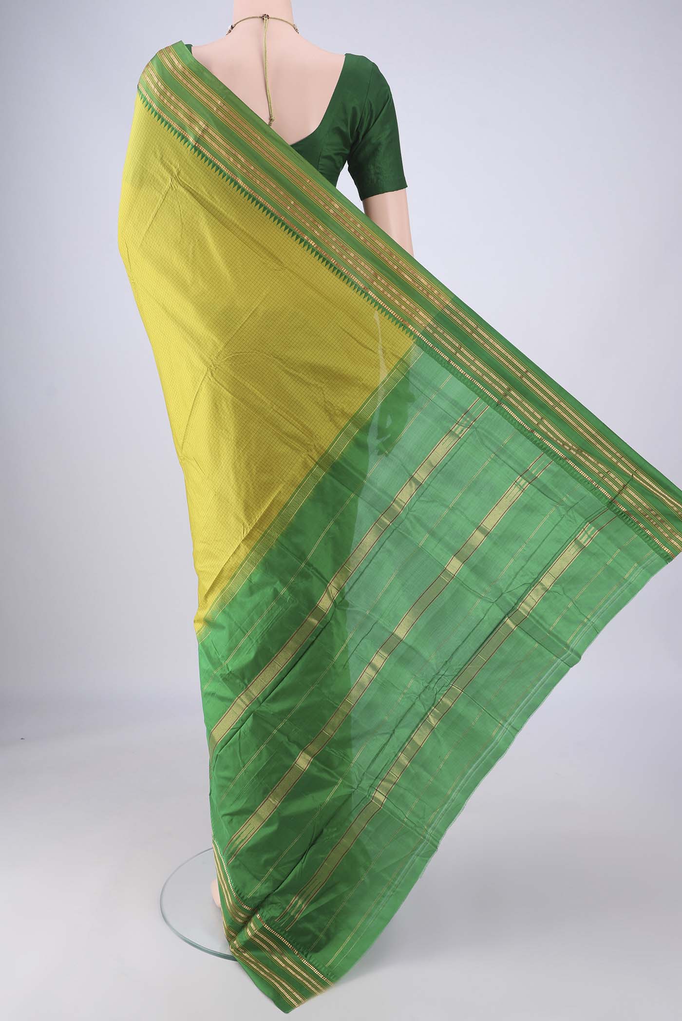 Flat view of Light Green Narayanpet Silk Saree with Checked design on the body and Zari Border. 