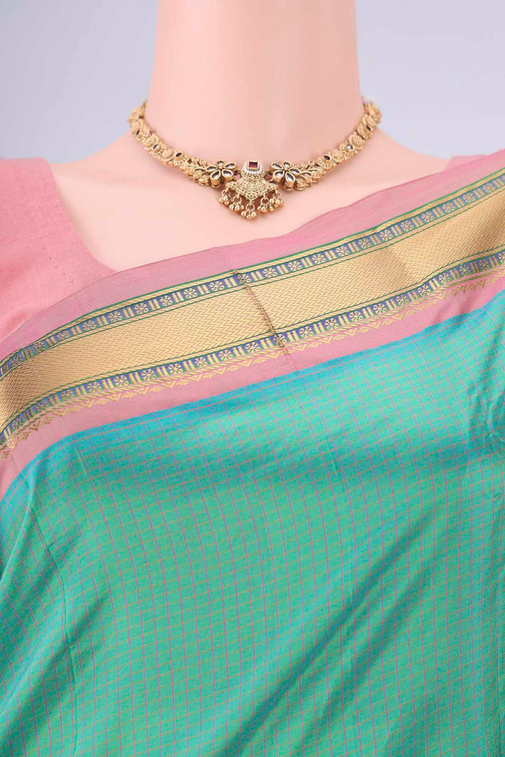 Border image of Sea Green Narayanpet Silk Saree with Checked design on the body and Zari Border. 