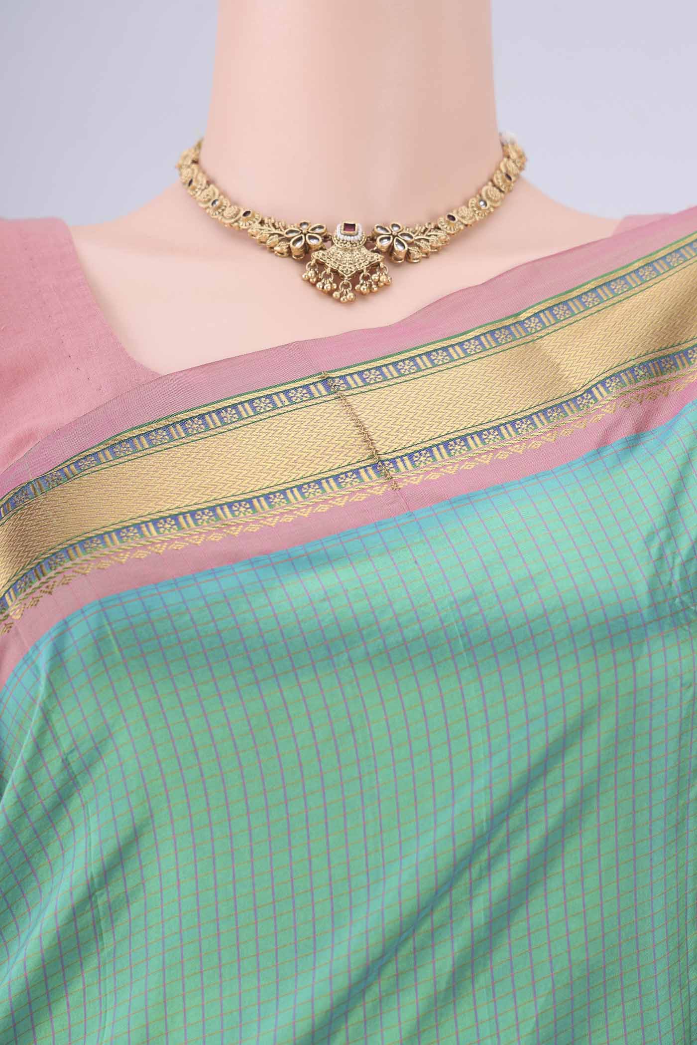 Border image of Sea Green Narayanpet Silk Saree with Checked design on the body and Zari Border. 