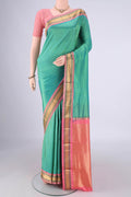 Sea Green Narayanpet Silk Saree with Checked design on the body and Zari Border.  displayed on a mannequin