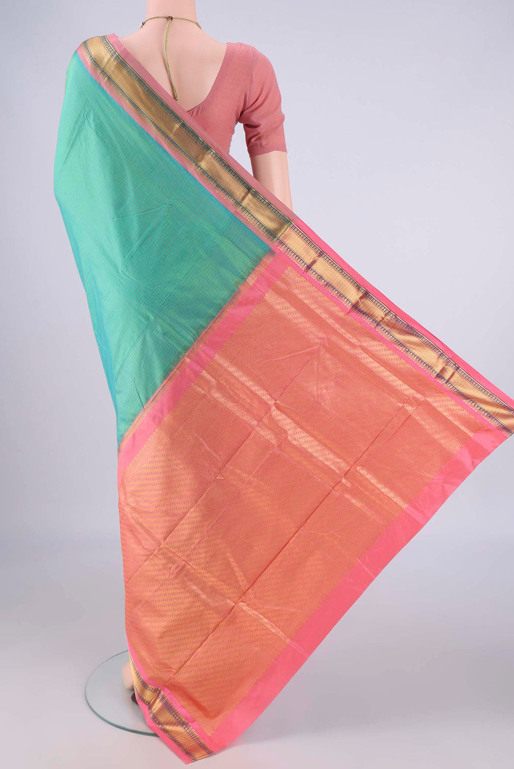 Flat view of Sea Green Narayanpet Silk Saree with Checked design on the body and Zari Border. 