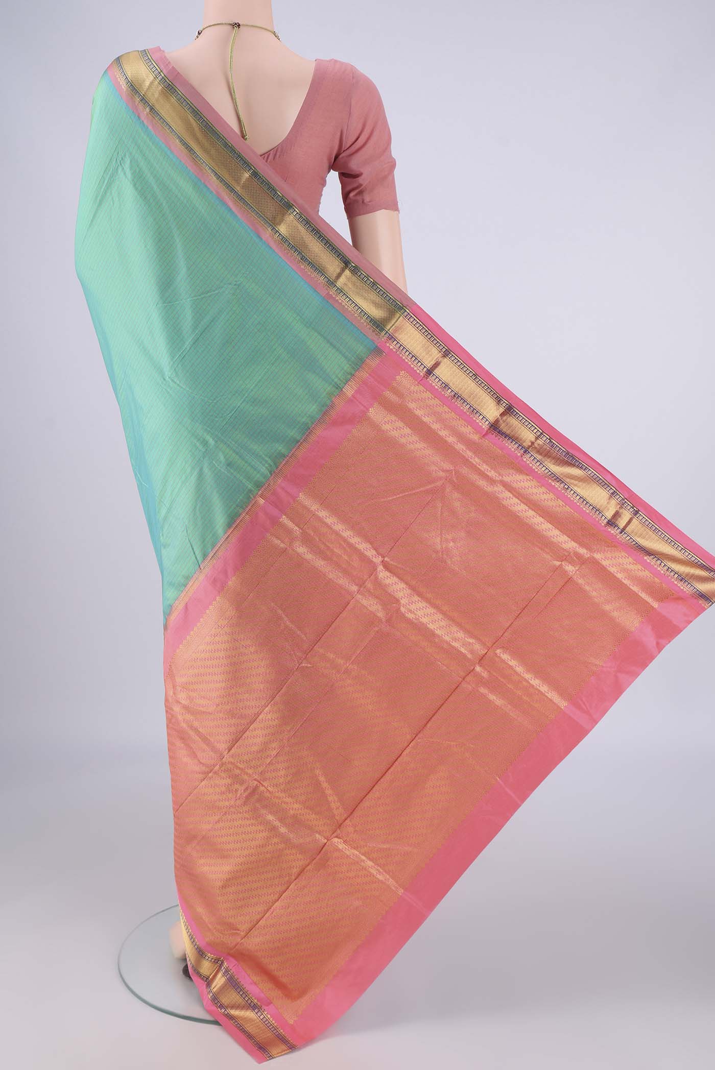 Flat view of Sea Green Narayanpet Silk Saree with Checked design on the body and Zari Border. 