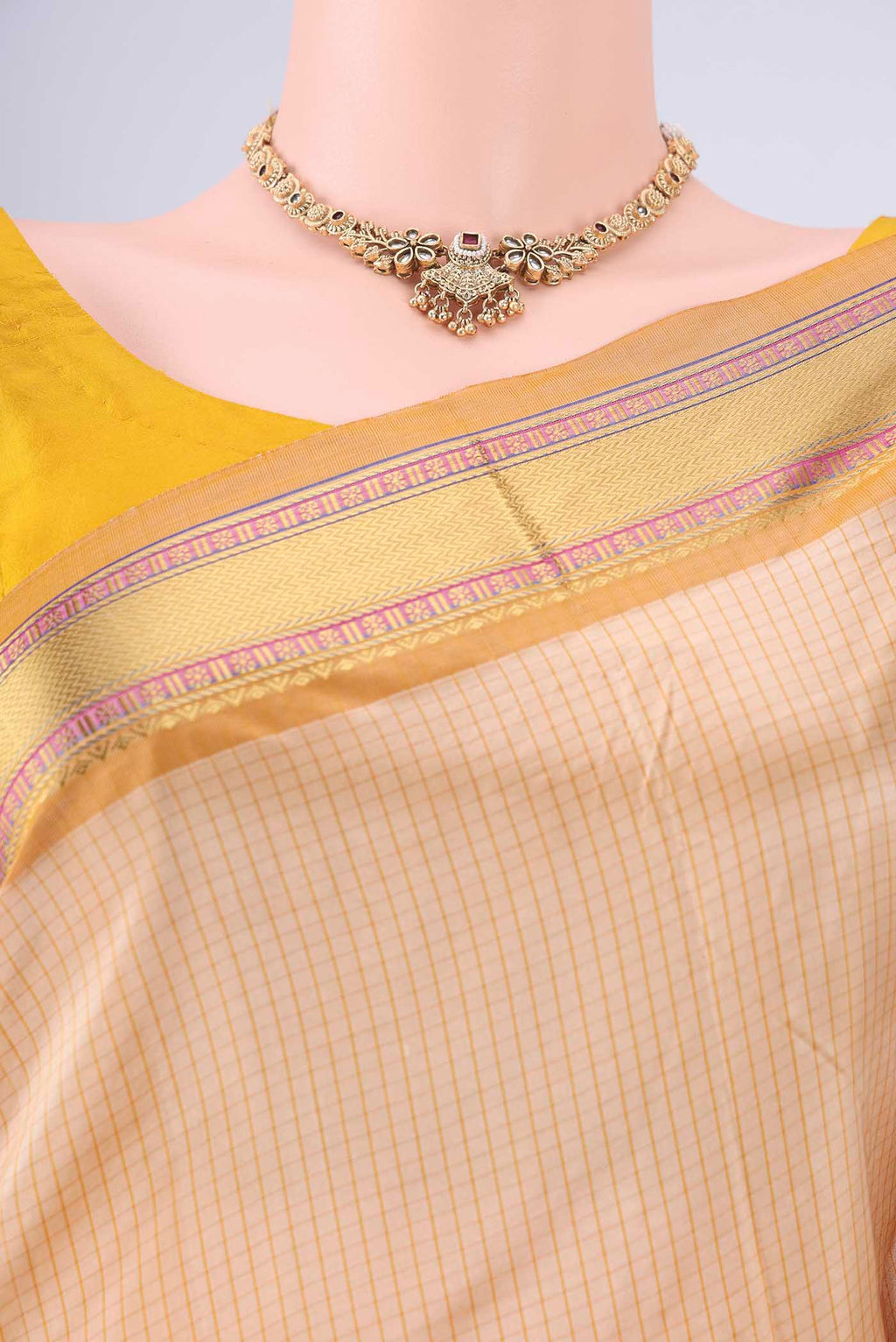 Border image of Cream Narayanpet Silk Saree with Checked design on the body and Zari Border. 