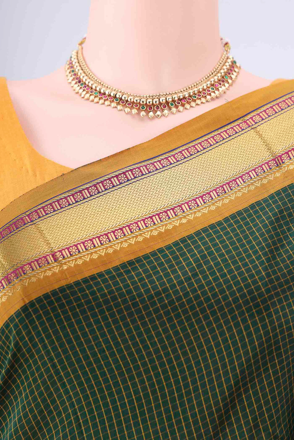 Border image of Bottle Green Narayanpet Silk Saree with Checked design on the body and Zari Border. 