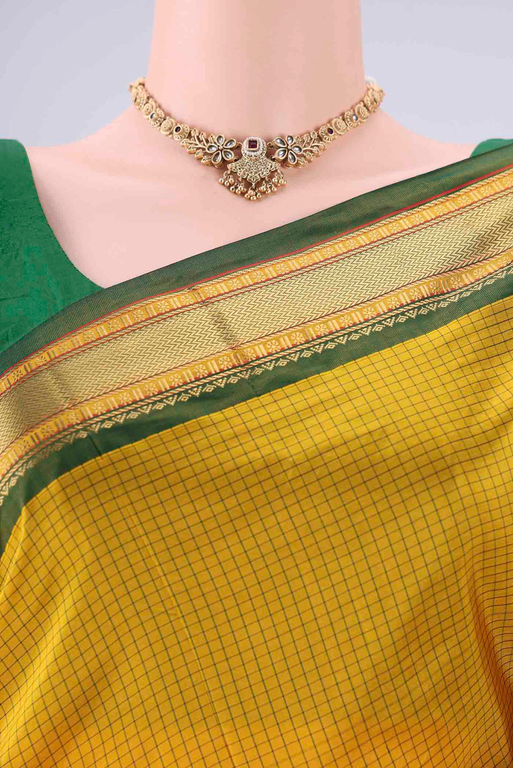 Border image of Yellow Narayanpet Silk Saree with Checked design on the body and Zari Border. 