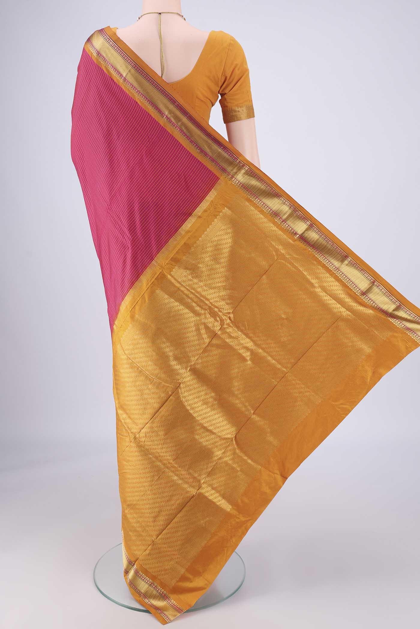 Flat view of Rani Pink Narayanpet Silk Saree with Checked design on the body and Zari Border. 