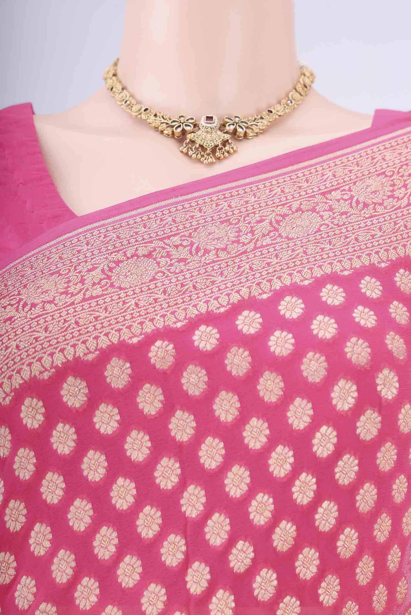 Border image of Pink Banarasi Georgette Saree with Zari Butta on the body and Zari Border. 