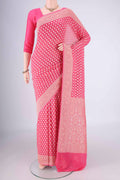 Pink Banarasi Georgette Saree with Zari Butta on the body and Zari Border.  displayed on a mannequin