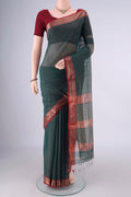 Bottle Green Maheshwari Cotton Saree with Stripes on the body and Zari Border.  displayed on a mannequin