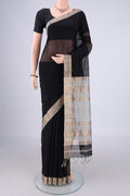 Black Maheshwari Silk Cotton Saree with Plain Body and Zari Border.  displayed on a mannequin