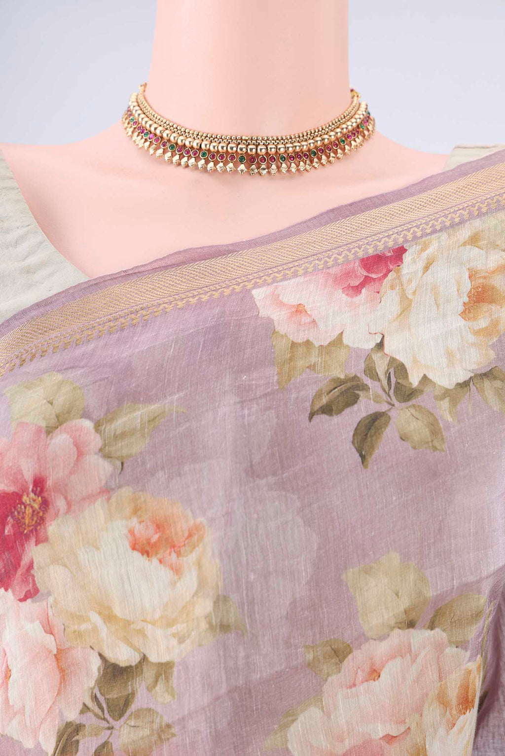 Border image of Mauve Linen Saree with Printed design on the body and Zari Border. 