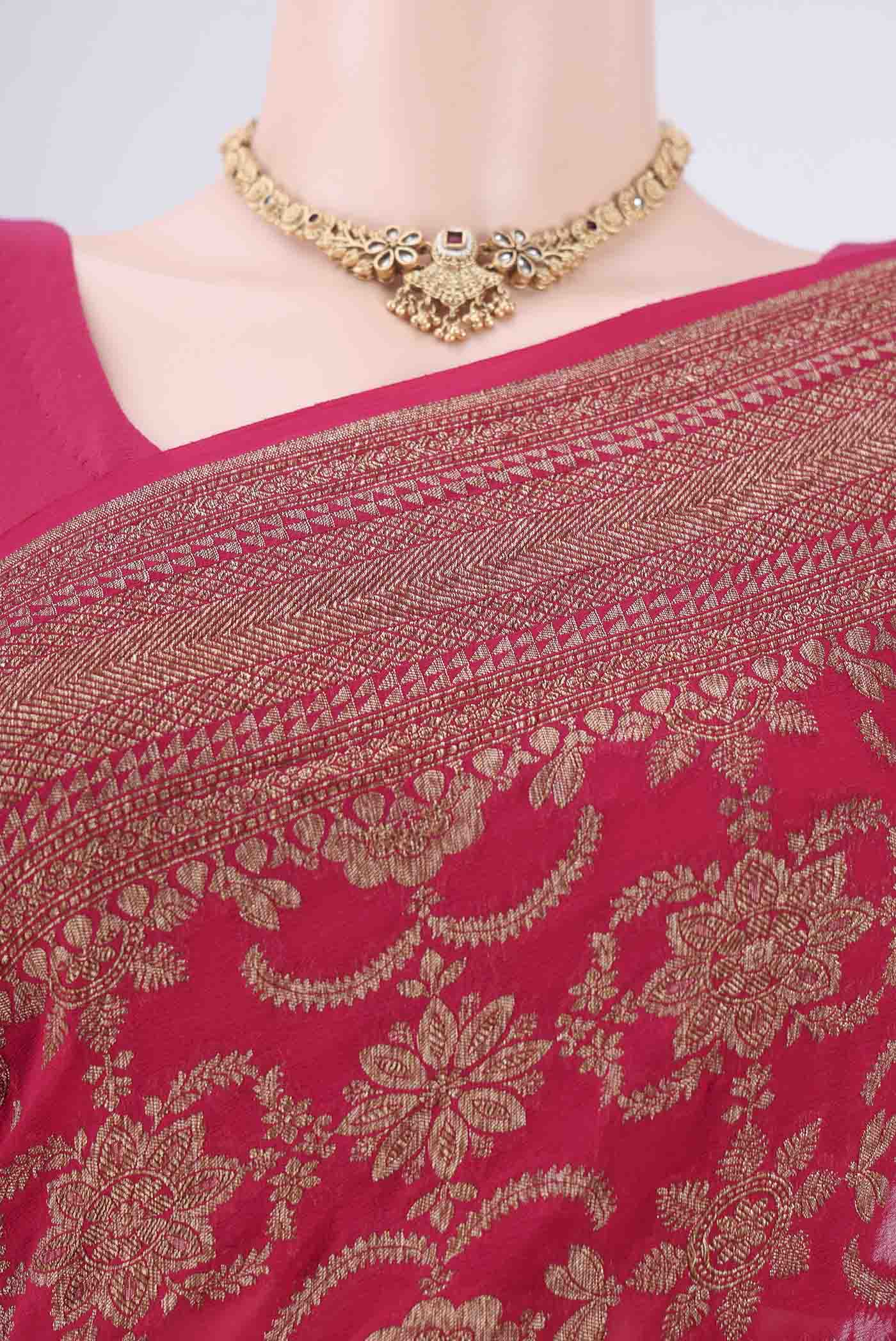 Border image of Rani Pink Banarasi Georgette Saree with Zari Brocade on the body and Zari Border. 