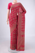 Rani Pink Banarasi Georgette Saree with Zari Brocade on the body and Zari Border.  displayed on a mannequin